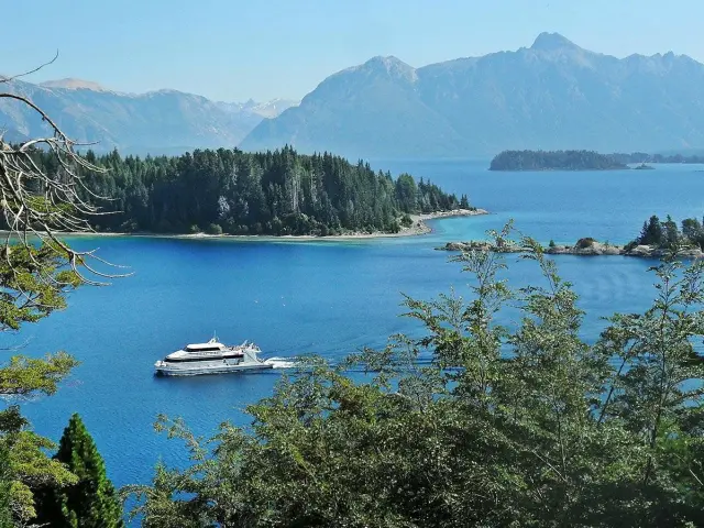 Enjoy navigating the azure-blue waters of the Nahuel Huapi