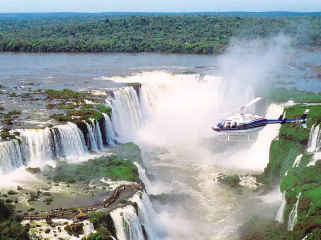 Witness the majestic beauty of the Iguazu Falls from a stunning bird’s-eye view