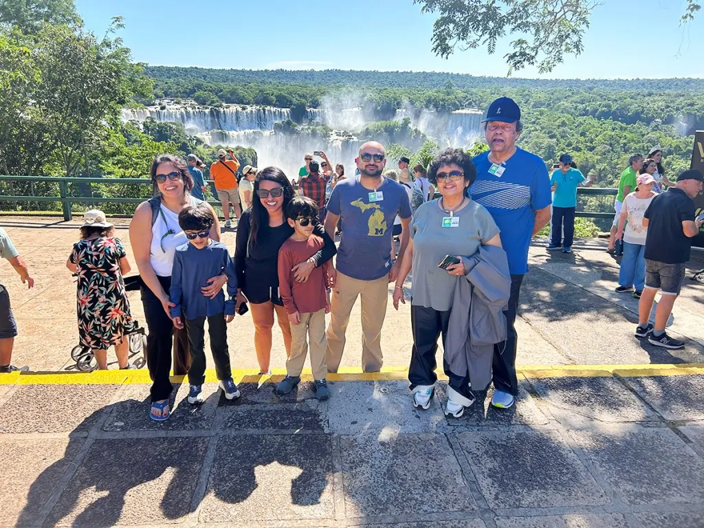 Three generations with the breathtaking Iguazu Falls backdrop