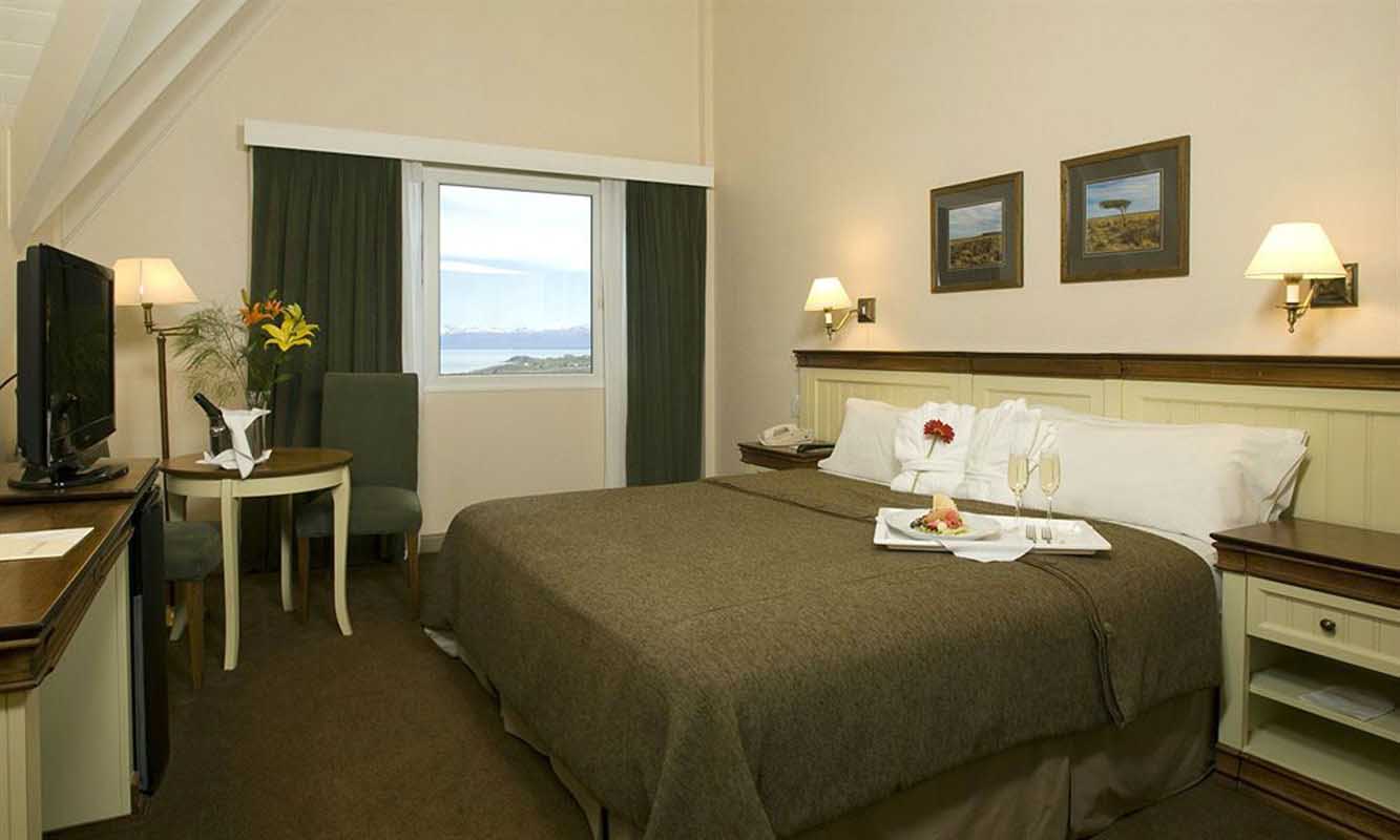 Standard category room with queen size bed