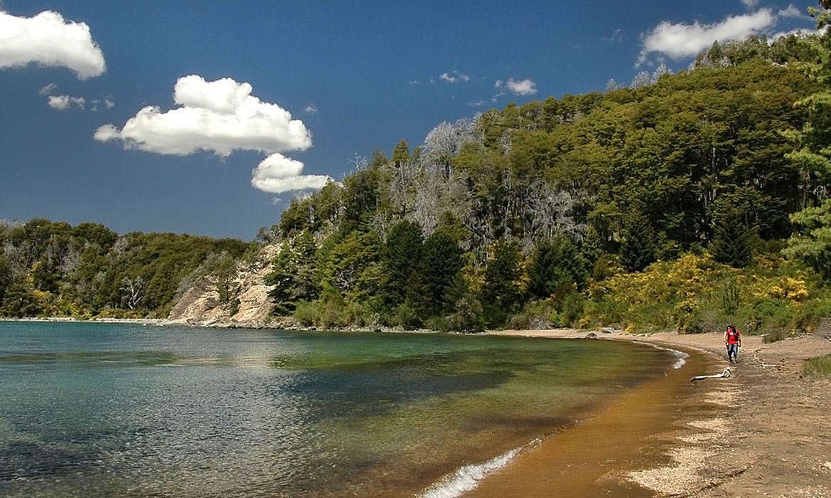 The beach at Victoria Island is a colorful marriage of water, sand, and forest
