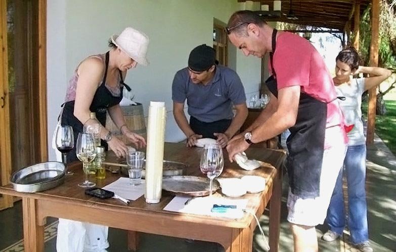 Step into the role of chef, as you enjoy a delightful cooking class and wine tasting experience