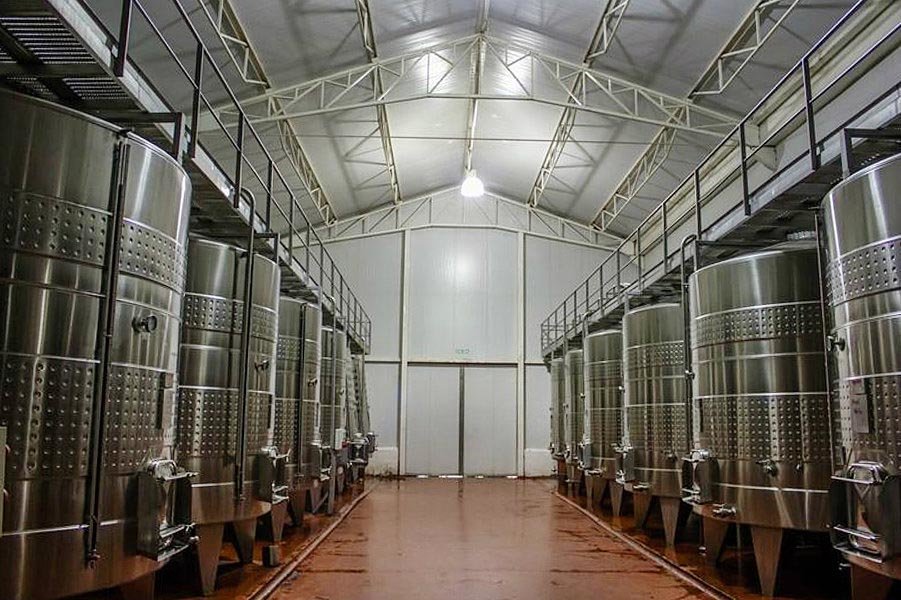 We’ll enjoy the rare treat of visiting the winery’s production facility