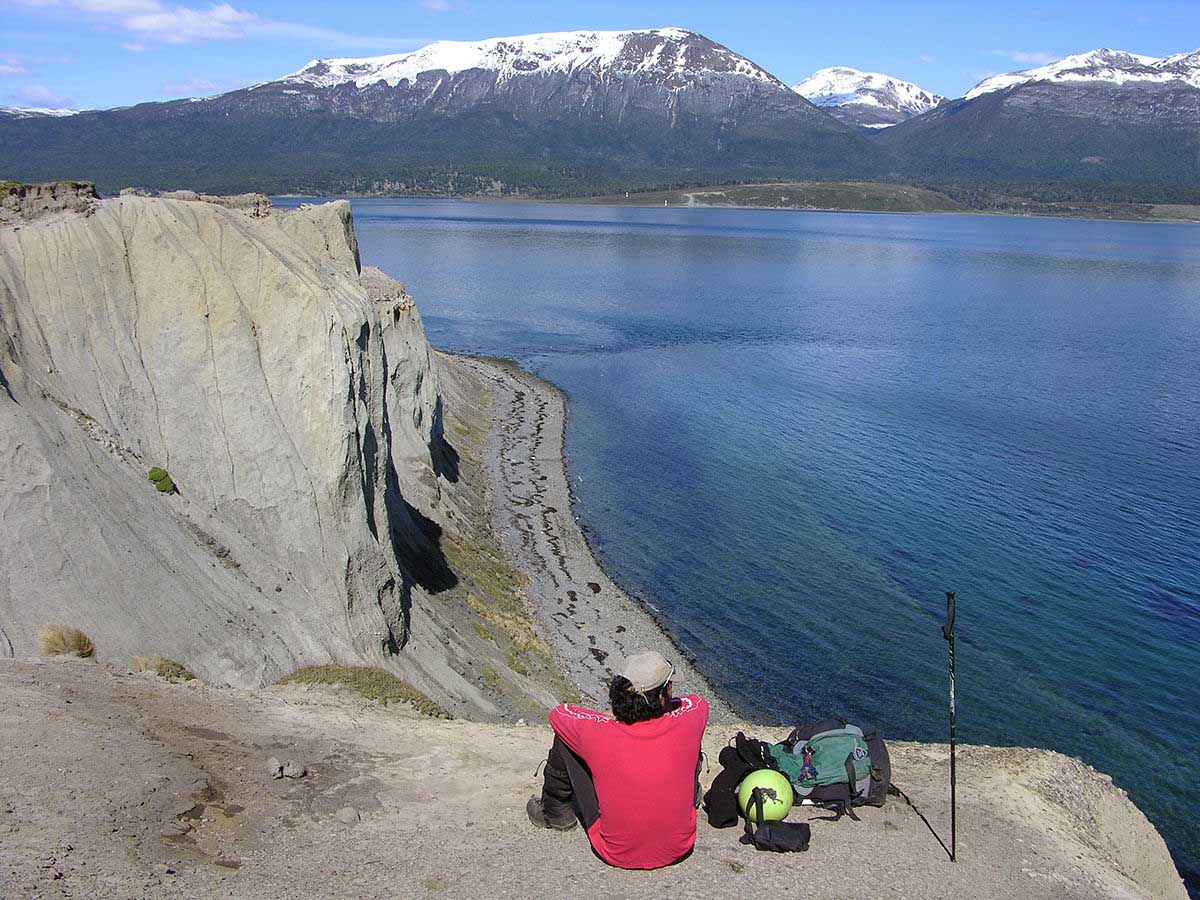 Blue sky, water, and the backdrop of the mammoth snow-capped mountain range