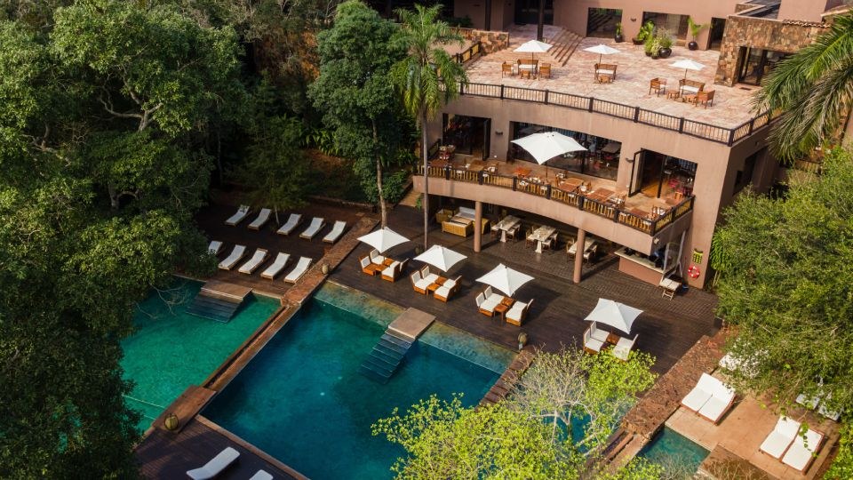 The hotel’s pools surrounded by the rainforest
